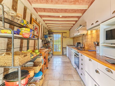 Cabinetry, Countertop, Lighting, Food, Kitchen Appliance, Kitchen Stove, Shelf, Interior Design, Wood, Kitchen