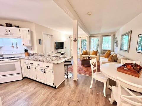 Living, dining, and kitchen area