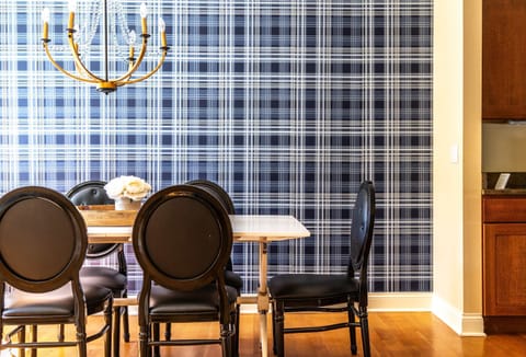 Elegant meals can be enjoyed at the dining table, offering seating for 6