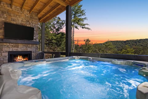 Hot Tub Retreat: Soak in stunning mountain views as you unwind beneath the stars, or start your day off right with a refreshing sunrise soak!