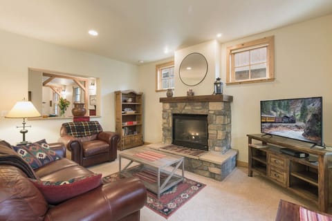 Main Living Space - Gas Fireplace, TV and Deck