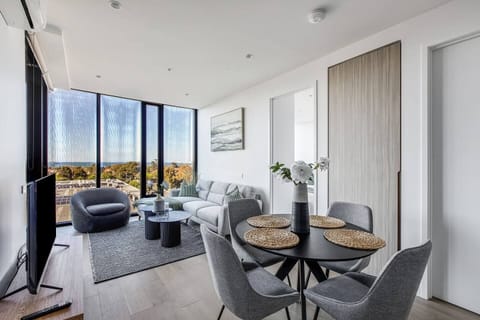 Enjoy meals together in the inviting, open-plan dining area, which includes a four-seater table.
