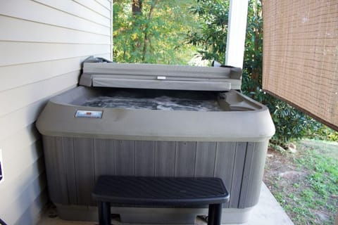 Gather with loved ones and enjoy quality time in our cozy outdoor hot tub.
