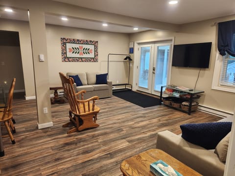 Open great room with wide paths for accessibility.