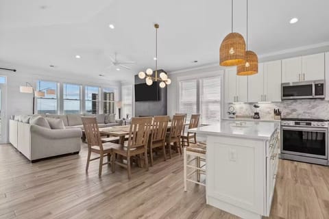 View of kitchen, living and dining areas