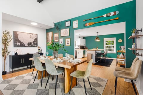 Dining room seats eight, perfect for family feasts or game night gatherings