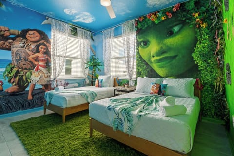 Moana-themed room with vibrant decor, and a magical island vibe.
