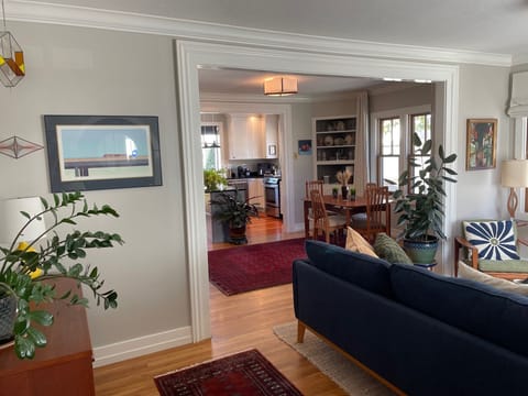 Another view of living room into dining and kitchen
