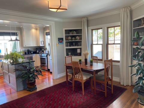 Another view of the dining room and into the kitchen