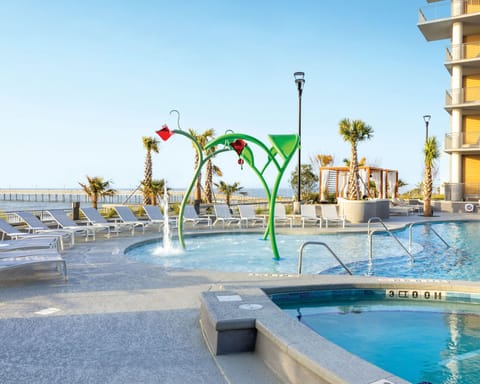 Soak up the sun in the poolside area with comfortable lounge chairs and ocean views.
