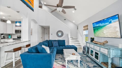 Large living room, couch, and TV!