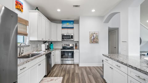 Spacious kitchen w/ modern appliances.