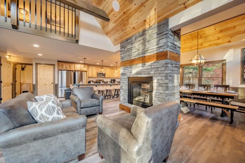 The 2nd Floor Open Floor Plan Allows Everyone to Be a Part of the Action Around the See Through Fireplace.