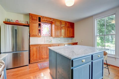 Marble Countertops and Stained Glass in Kitchen