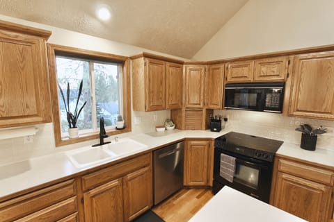 Well stocked kitchen with dinnerware, cookware, bakeware + more!