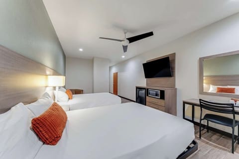 Unit with 2 Double beds. Exact unit will be assigned upon arrival. Views, colors, and decor may vary.