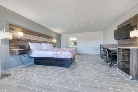 Unwind in a spacious room with crisp linens and work desk.