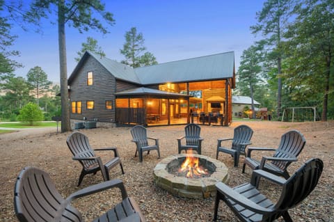 Cozy up around the fire pit under starlit skies and enjoy the peace that surrounds this beautiful home nestled in the heart of nature.