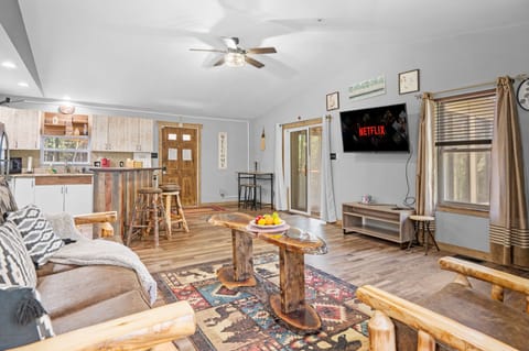 Curl up on the sofa with a favorite show on the smart TV, or gather around the bar for easy conversation and snacks.