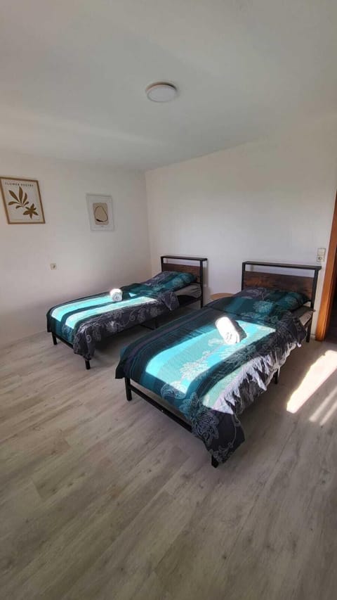 Bedroom 1 | 2 comfortable single beds with wardrobe (1)
