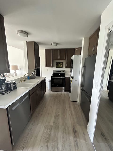 Nice galley kitchen all new appliances! Great view from the sink!