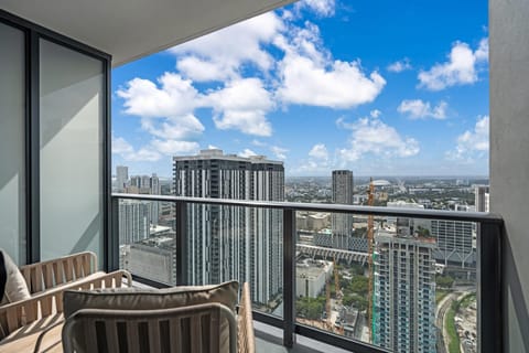 Balcony bliss awaits with sky-high city views to inspire your day.
