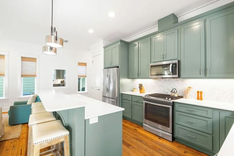 Kitchen island features seating for 4