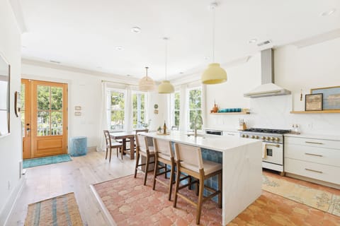 Additional barstool seating at the island counter.