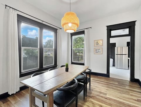 Gorgeous dining room table leading into the kitchen
