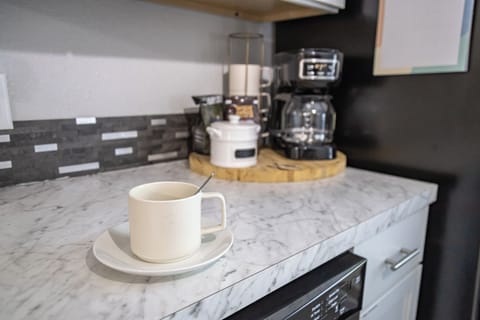 Start your day with fresh coffee and tea options.