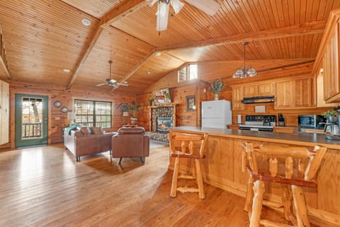 Your romantic haven awaits: cozy living, inviting bedroom, and kitchen