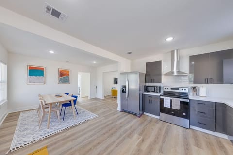 Dining Room: Chic dining area with a table for meals and gatherings.