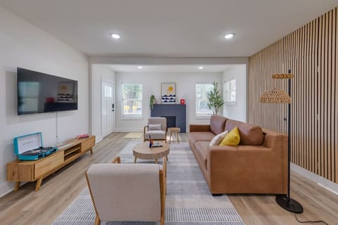 Living Room: Cozy seating area with stylish decor, perfect for relaxing or socializing.
