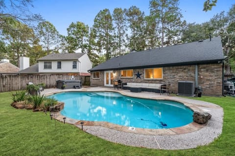 The backyard is your Private Oasis....pool, spa, outdoor seating, & gas grill are ready and waiting!