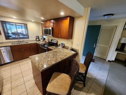 Kitchen showing counter space with room for two. 
