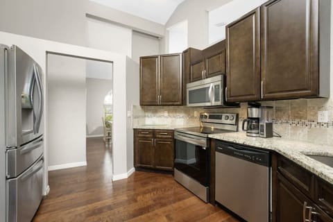 Kitchen has Pots and Pans and Cooking Utensils