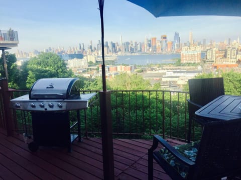 Complete view of New York City from private deck area.