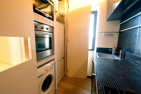 Property, Laundry Room, Home Appliance, Cabinetry, Washing Machine, Clothes Dryer, Interior Design, Building, Floor, Flooring
