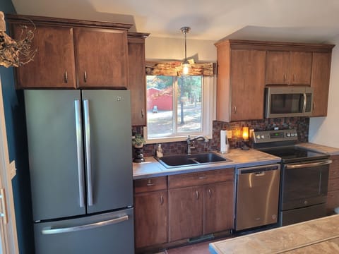 KITCHEN (SECOND FLOOR):  The lodge has a full kitchen with all appliances including a dishwasher.