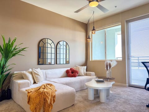 Rustic Vibe Apartment with a stunning Hollywood hills view Living room with a comfy L-shaped sofa and a 55" Smart TV with (Netflix, Hulu, and Disney+ we logged them remotely) included for free