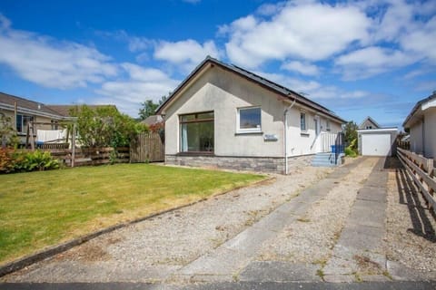 Front of house with off road parking