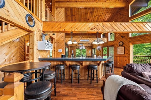 Three dining areas. High top table, kitchen bar & picnic style dining table