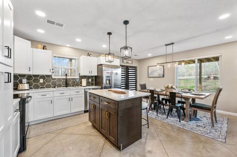 You’ll find cooking utensils, pots and pans, and plenty of dishes and silverware—everything you need to prepare and enjoy dinner together.