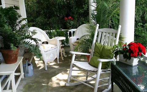 Private porch entry with parking options including off-street