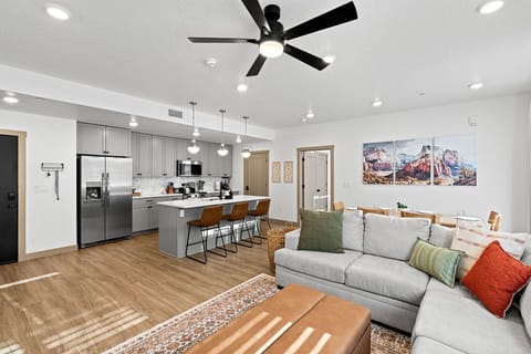 Living Room with Queen Sofa Sleeper and Twin Ottoman Sleeper + Kitchen/Dining