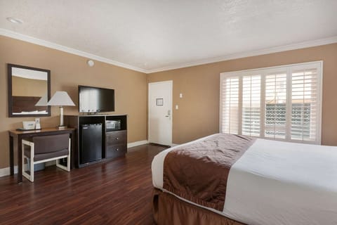 Unit with 1 King bed and 1 Queen bed. Exact unit will be assigned upon arrival. Views, colors, and decor may vary.