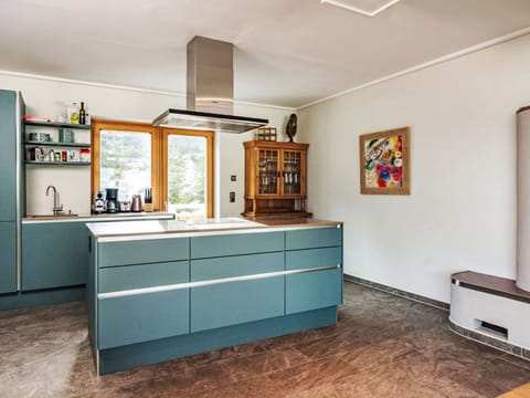 Cabinetry, Furniture, Countertop, Building, Tap, Drawer, Wood, Picture Frame, Interior Design, Lighting