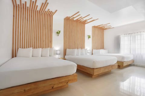 Bedroom. Exact unit will be assigned upon arrival. Views, colors and decor may vary.