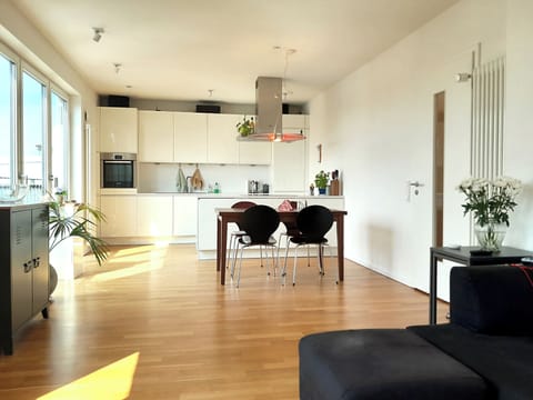 The bright, light-filled living room.