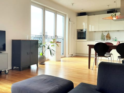 The bright, light-filled living room.